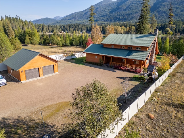 birds eye view of property with a mountain view