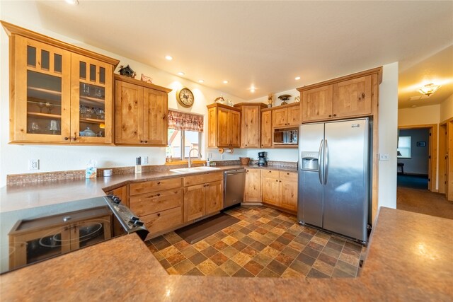 kitchen featuring stainless steel appliances and sink