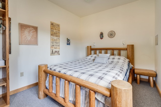 bedroom featuring dark colored carpet