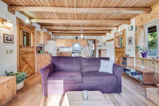 living room with wooden ceiling, beam ceiling, and light hardwood / wood-style flooring