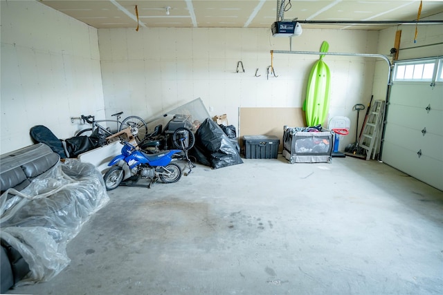 garage featuring a garage door opener