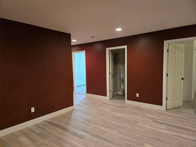 empty room with light wood-type flooring