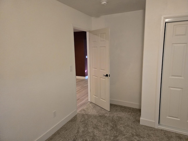 unfurnished bedroom with carpet