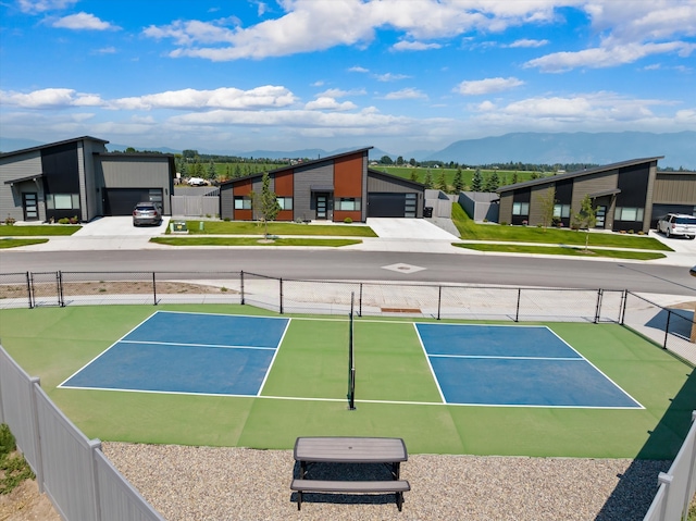 view of sport court with a mountain view