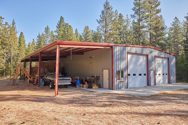 view of outbuilding featuring a garage