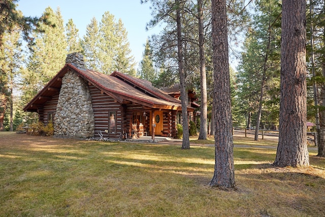 view of home's exterior featuring a yard