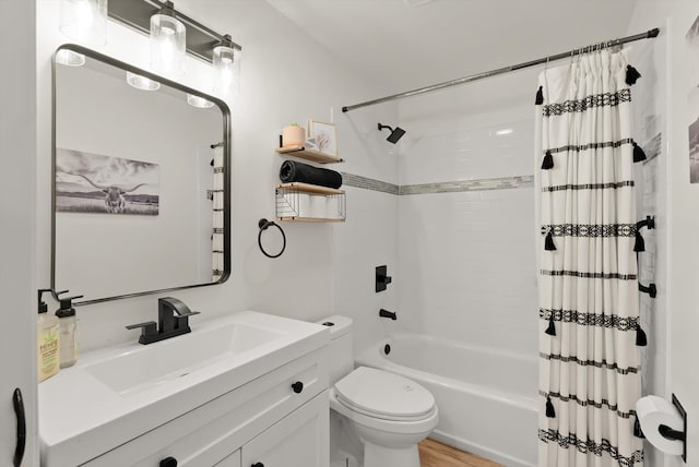 full bathroom with toilet, shower / tub combo, vanity, and wood-type flooring