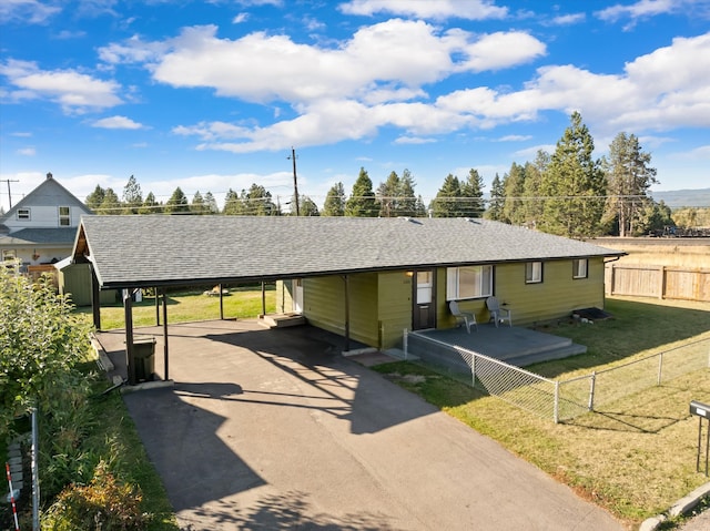 ranch-style house with a front lawn