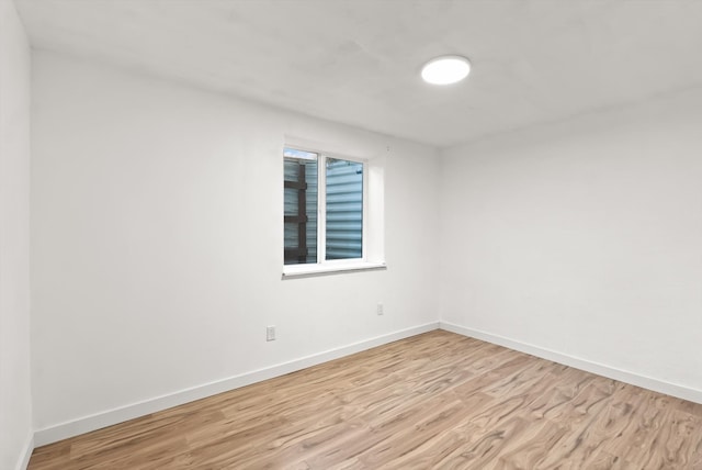 unfurnished room featuring light hardwood / wood-style flooring