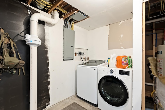 washroom with independent washer and dryer, electric panel, and gas water heater