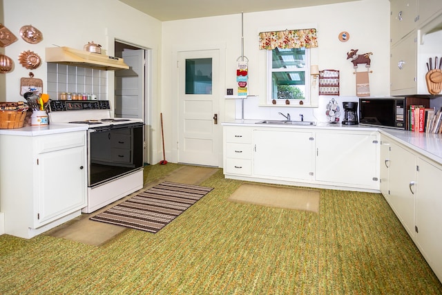 kitchen featuring sink, tasteful backsplash, white cabinetry, ventilation hood, and electric range