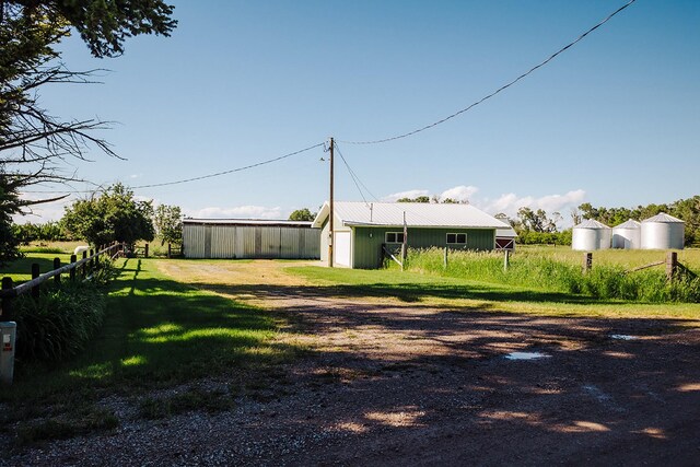 6058 Cottonwood Creek Rd, Lewistown, MT 59457 - view of yard with an outdoor structure and an outbuilding