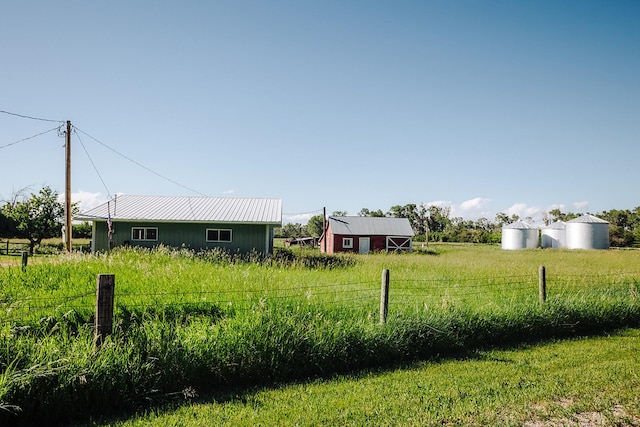 6058 Cottonwood Creek Rd, Lewistown, MT 59457 - view of yard with an outdoor structure and a view of rural / pastoral area