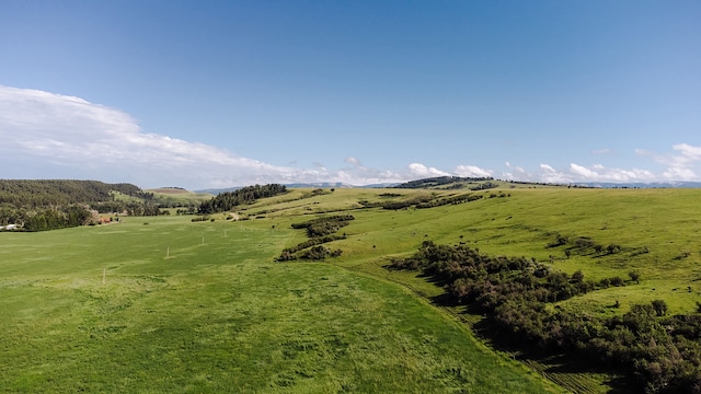 property view of mountains featuring a rural view