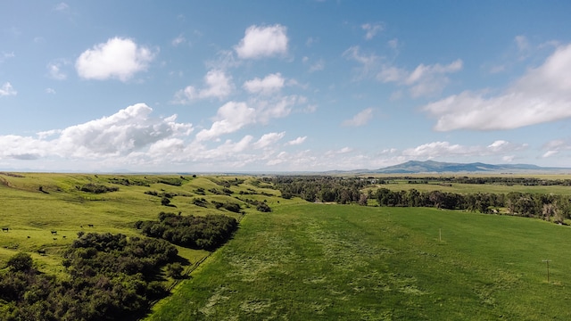 property view of mountains featuring a rural view