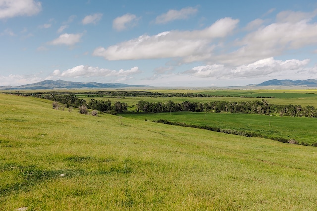 property view of mountains featuring a rural view