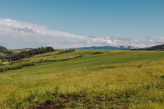 exterior space with a rural view