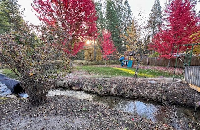 view of yard featuring a playground