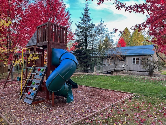 view of play area featuring a lawn