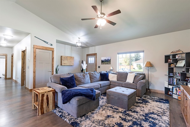 living room with vaulted ceiling, dark hardwood / wood-style flooring, and ceiling fan