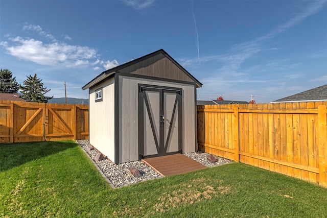 view of outdoor structure with a lawn