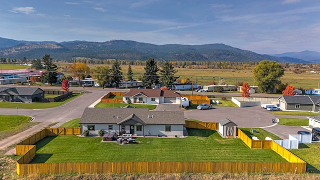 drone / aerial view featuring a mountain view