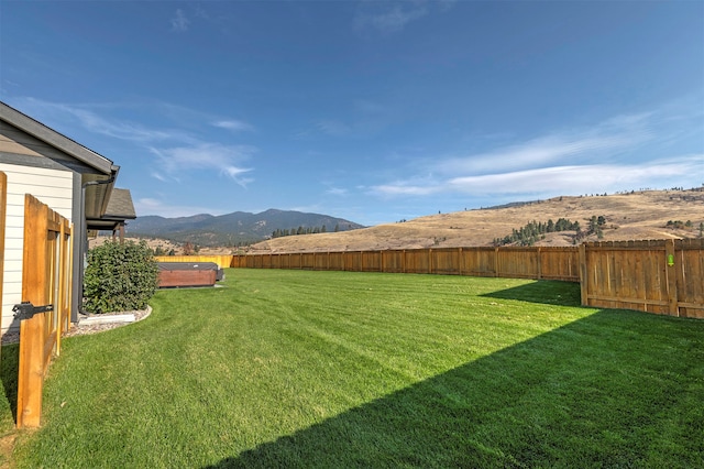 view of yard with a mountain view