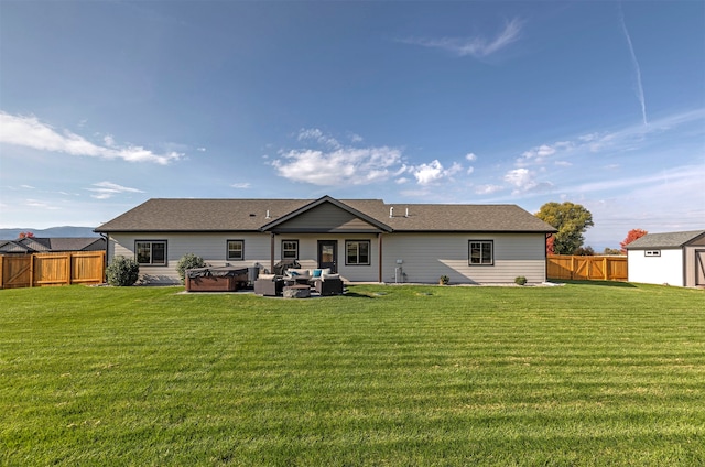 back of property featuring a patio, a lawn, a storage unit, and an outdoor living space