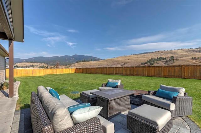 view of patio / terrace with outdoor lounge area and a mountain view