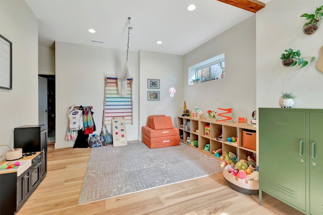 rec room featuring light hardwood / wood-style floors