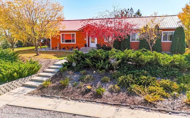52772 Herak Rd, Charlo, MT 59824 - view of front of home featuring faux log siding and metal roof