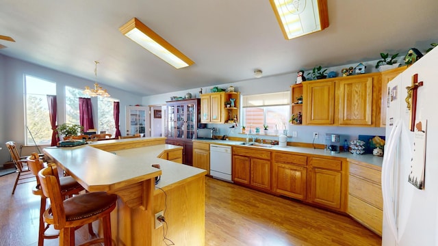 52772 Herak Rd, Charlo, MT 59824 - kitchen featuring a healthy amount of sunlight, open shelves, white appliances, and light countertops
