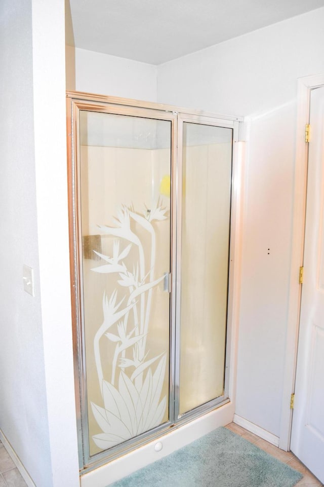 52772 Herak Rd, Charlo, MT 59824 - full bath featuring tile patterned flooring and a stall shower