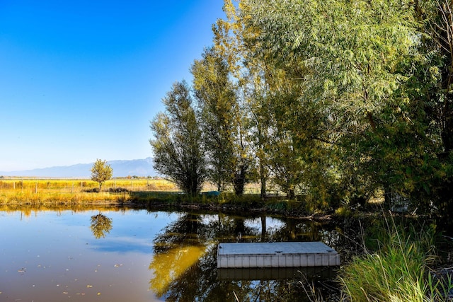 52772 Herak Rd, Charlo, MT 59824 - view of dock featuring a water and mountain view
