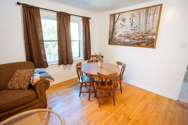 dining room with light hardwood / wood-style floors