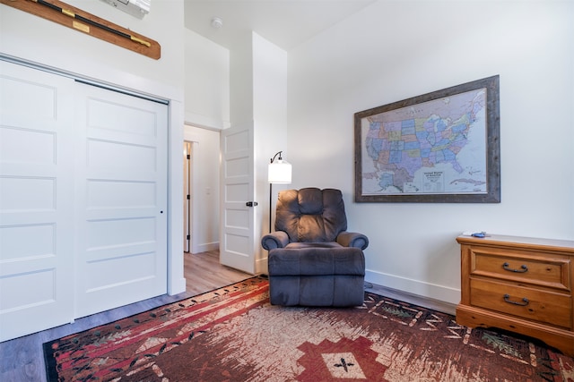 living area with wood-type flooring