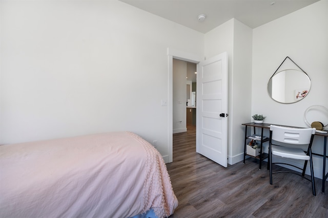 bedroom featuring dark wood-type flooring