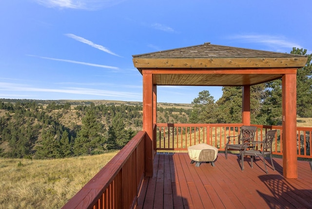 wooden deck featuring a gazebo