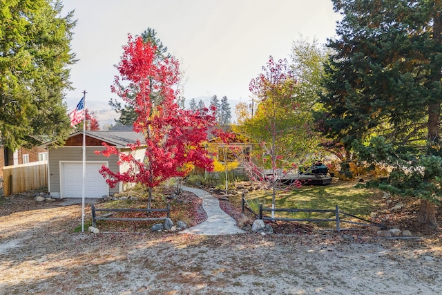 view of yard with a garage