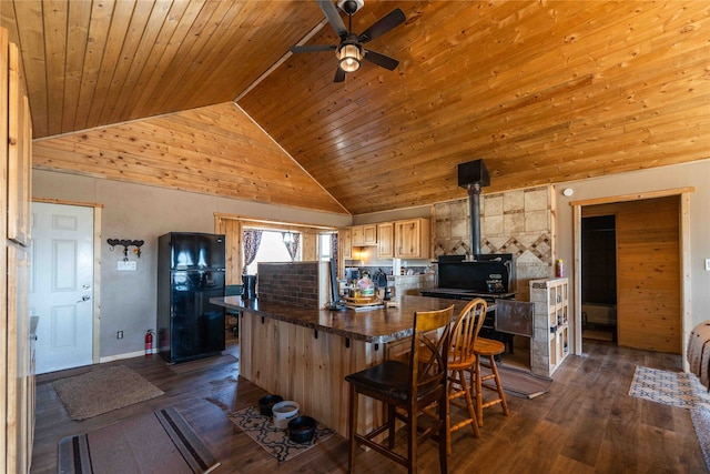 dining room with ceiling fan, high vaulted ceiling, wooden ceiling, and dark hardwood / wood-style floors