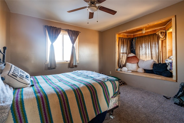 bedroom featuring ceiling fan and carpet floors