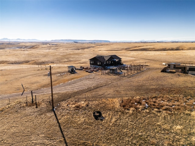 aerial view featuring a mountain view and a rural view