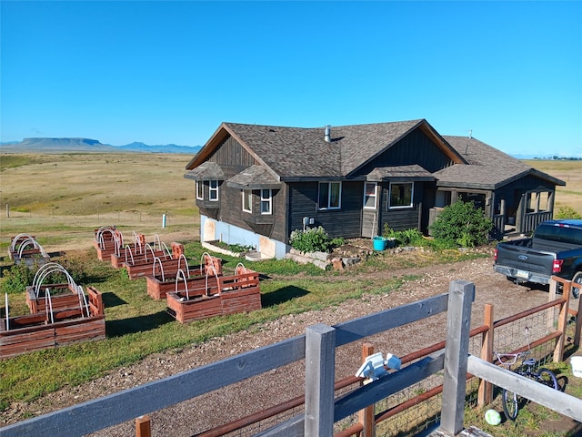 view of front facade featuring a mountain view