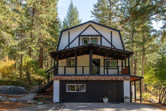 44632 Singing Creek Ln, Ronan, MT 59864 - view of front facade featuring stairs and stucco siding