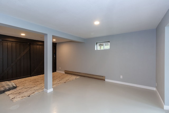 basement featuring baseboard heating