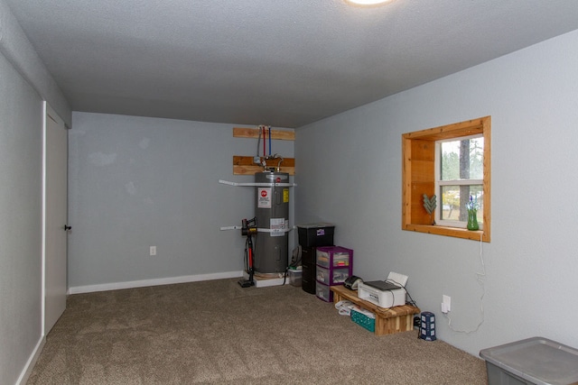 interior space featuring a textured ceiling, carpet floors, and strapped water heater