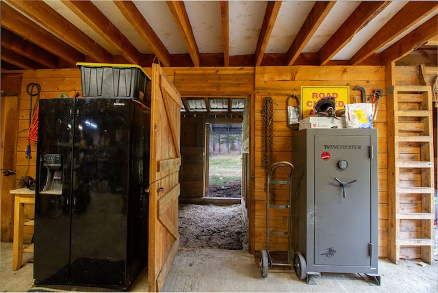 interior space featuring wood walls