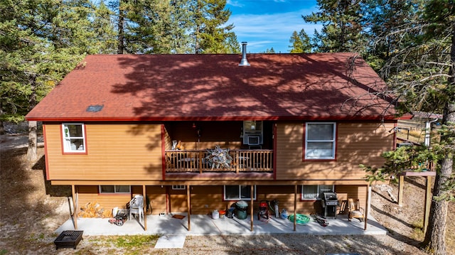 rear view of house featuring a patio area