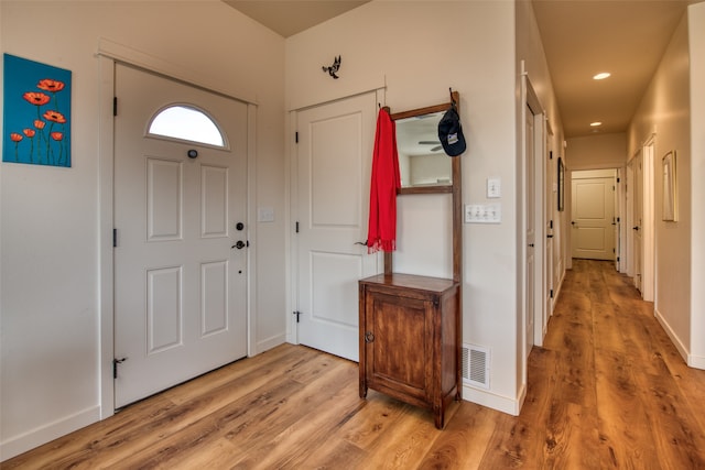 foyer featuring wood-type flooring