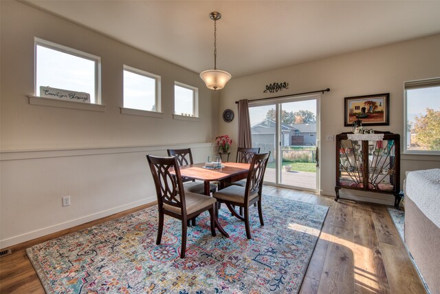 dining room with hardwood / wood-style floors